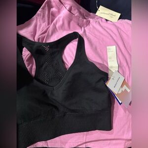 Bundle of Women's Sports Bra and pink shirt size Medium. Nwt
